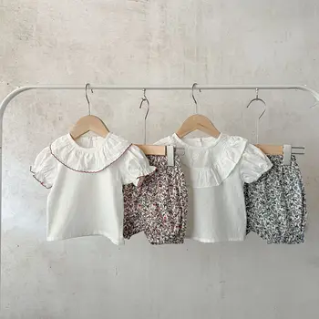 Детский комплект 2023, летняя хлопковая блузка с воротником-стойкой в корейском стиле для маленьких девочек, шорты с цветочным рисунком, повседневный простой милый комплект из двух предметов